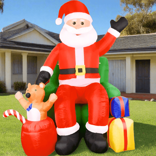 Inflatable Santa Sitting on Chair with Bear and Gifts - 230cm