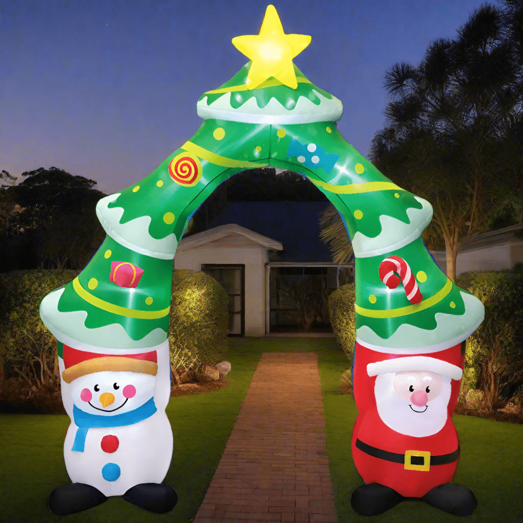 Inflatable Christmas arch with Santa Claus, snowman, and tree design on a white background