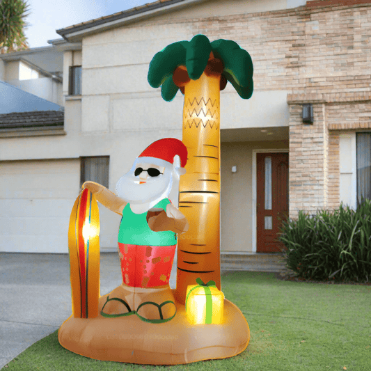 Santa with Surfboard and Palm Tree Inflatable - 240cm