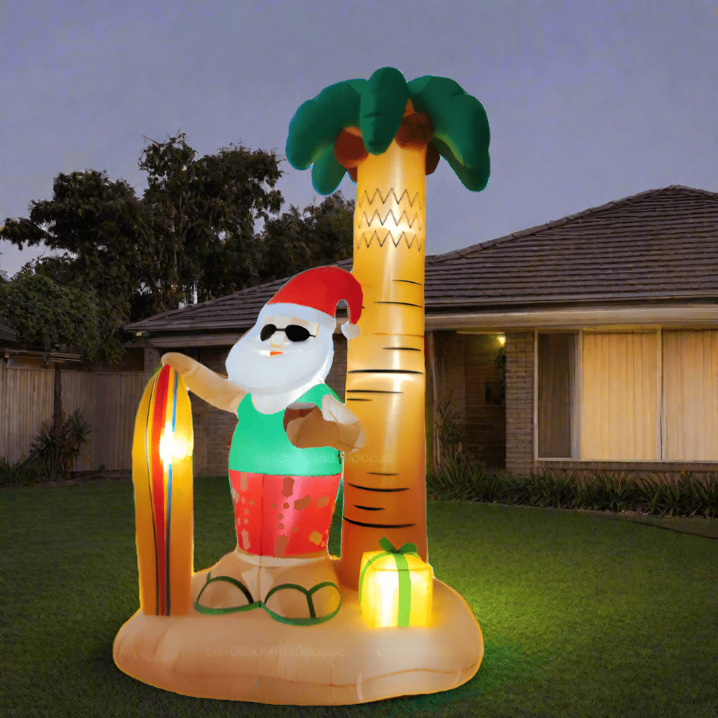 Santa with Surfboard and Palm Tree Inflatable - 240cm