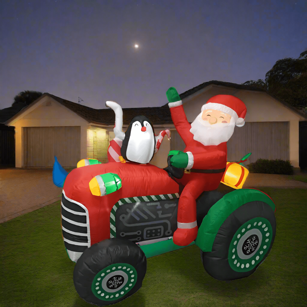 Santa's tractor and Penguin Inflatable - 150cm