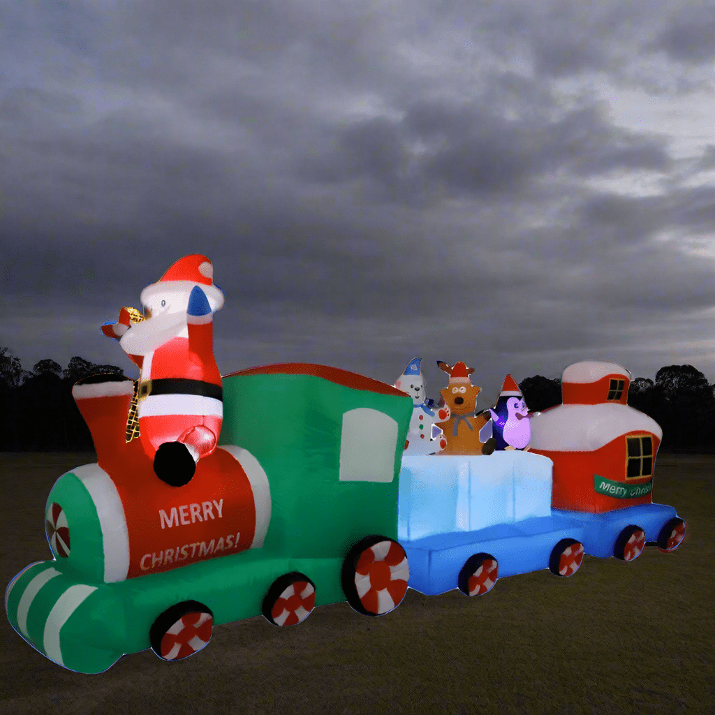 Inflatable Christmas train with Santa Claus and other characters on a white background