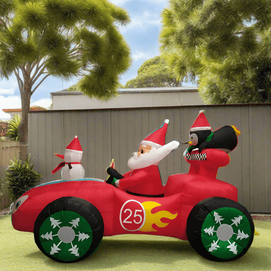 Santa, Snowman & Penguin in Christmas Race Car Inflatable - 250cm