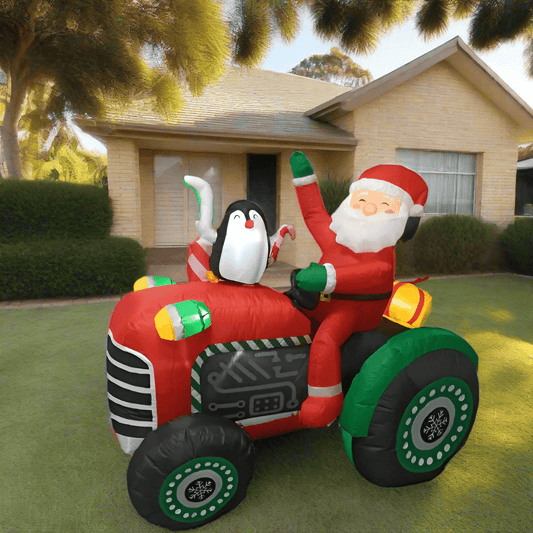 Santa's tractor and Penguin Inflatable - 150cm